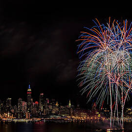 The New York City Skyline Sparkles by Susan Candelario