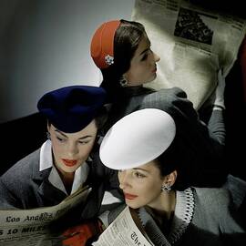 Three Models Wearing Assorted Hats by Horst P. Horst
