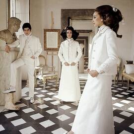 Three Models Wearing Clothing By Valentino by Henry Clarke
