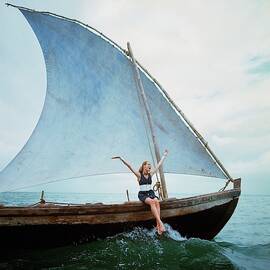 Veruschka Von Lehndorff Sitting On Edge by Franco Rubartelli