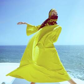 Veruschka Wearing A Yellow Kaftan by Henry Clarke