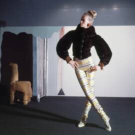Veruschka Wearing Fur Jacket And Striped Tights by Horst P. Horst
