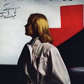 Vogue Cover Featuring A Model Wearing A White by Horst P. Horst