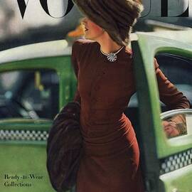 Vogue Cover Featuring A Woman Getting by Constantin Joffe