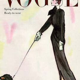 Vogue Cover Featuring A Woman Walking A Dog by Rene R. Bouche