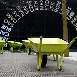 Waiting Wheelbarrows by Richard Reeve