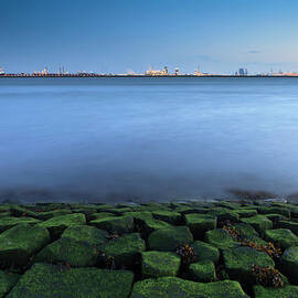 Waves Breaking On A Breakwater by Gaps