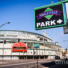 Wrigleyville Sign and Wrigley Field in Chicago by Paul Velgos