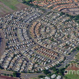 Housing development and highway by Sami Sarkis Photography