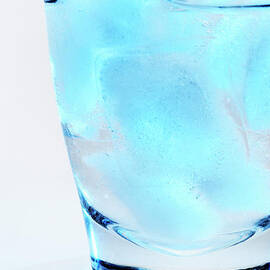 Ice cubes in glass by Sami Sarkis Photography