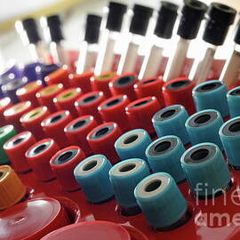 Tubes in a nurse medical suitcase by Sami Sarkis Photography