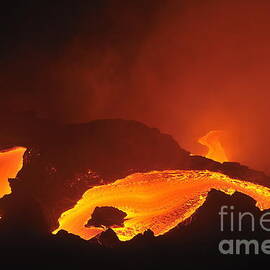 River of molten lava flowing to the sea by Sami Sarkis Photography