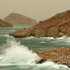Waves crashing on the coast by Sami Sarkis Photography