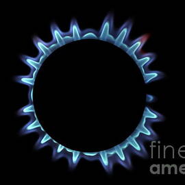 Lit blue gas ring by Sami Sarkis Photography