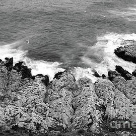 Waves crashing on the coast by Sami Sarkis Photography