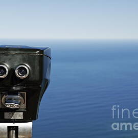 Binoculars facing ocean by Sami Sarkis Photography