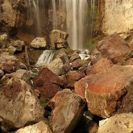 Falling In The Rocks by Adam Jewell