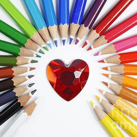 Heartshape and Circle of colorful crayons by Sami Sarkis Photography