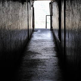 Light at the end of a dark corridor by Sami Sarkis Photography