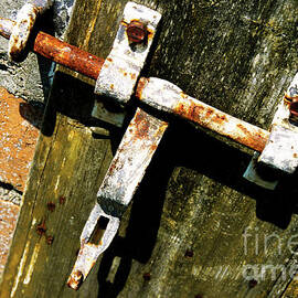 Locker on a farm door by Sami Sarkis Photography