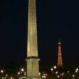 Obelisk of Luxor and Eiffel Tower at Night by Clarence Holmes