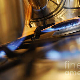 Pan on gas hob by Sami Sarkis Photography