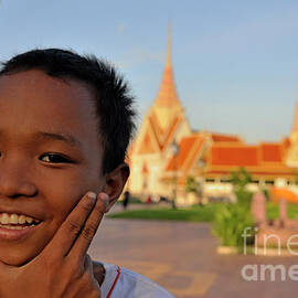 Smiling boy portrait by the Royal Palace by Sami Sarkis Photography
