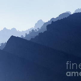 Sunbeams on Mountain summits by Sami Sarkis Photography