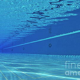 Swimming pool underwater view by Sami Sarkis Photography