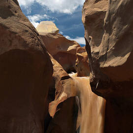 The Red Clay Faces of  Willis Creek.  Utah.  by Joe Schofield