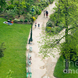 Visitors in the Champ de Mars by Clarence Holmes