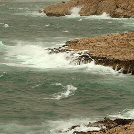 Waves crashing on the coast by Sami Sarkis Photography