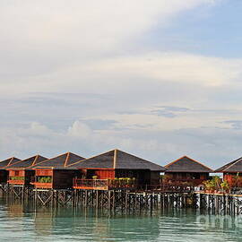 Wooden water bungalows by Sami Sarkis Photography