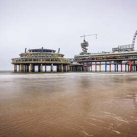 Beach view on the Pier in Scheveningen near Hague, Netherlands by Miroslav Liska