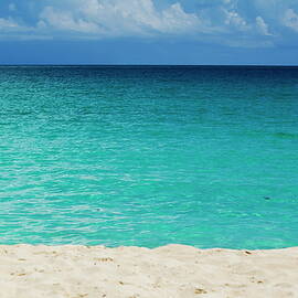 Beautiful transparent water and white sand beach by Sami Sarkis Photography