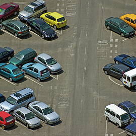 Crowded carpark full of cars by Sami Sarkis Photography