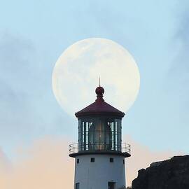 Full moon over Makapu'u Light by M C Hood