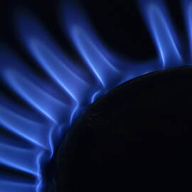 Lit blue gas ring by Sami Sarkis Photography