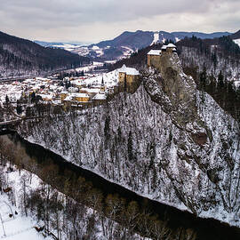 Medieval castle in winter by Miroslav Liska