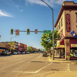 Street view with stores and hotels in Kalispell, Montana by Miroslav Liska