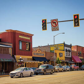Street view with stores and restaurants in Kalispell, Montana by Miroslav Liska