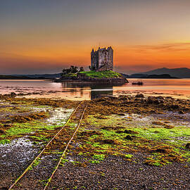 Sunset over Castle Stalker,  Scotland, United Kingdom by Miroslav Liska