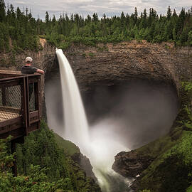 Tourist at Helmcken Falls in Wells Gray Provincial Park in Canada by Miroslav Liska