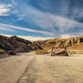 Welcome sign at the entrance to Death Valley National Park by Miroslav Liska