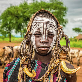 Young boy from the African tribe Mursi, Ethiopia by Miroslav Liska