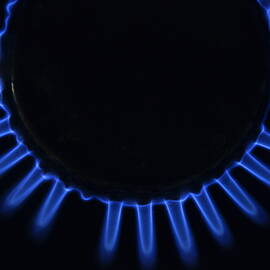 Lit blue gas ring by Sami Sarkis Photography