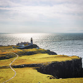 Neist Point lighthouse at Isle of Skye in Scotland by Miroslav Liska