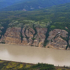 Airplane flying over the Yukon River by Waterdancer