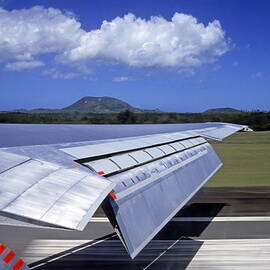 Airplane taking off by Sami Sarkis Photography