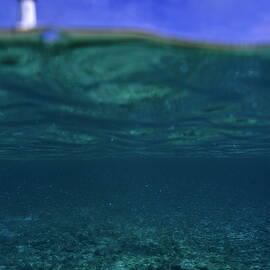 Amedee Lighthouse Island seen from underwater by Sami Sarkis Photography
